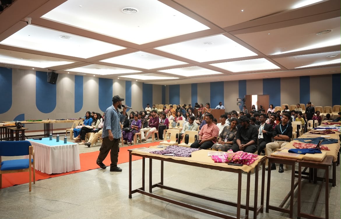 Speaker addressing students in a seminar hall