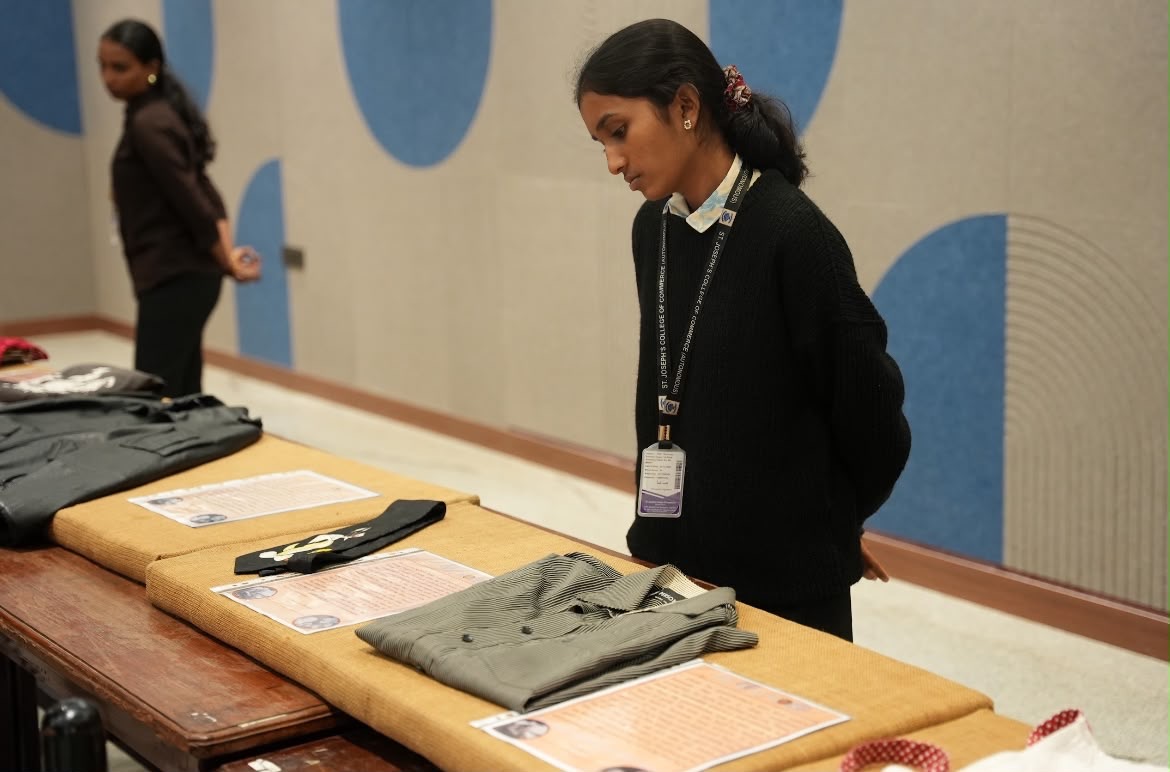 Student viewing an exhibit display table